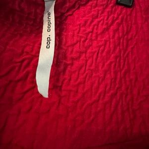 Red pleated skirt from Cop copine